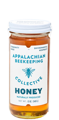 Jar of Appalachian Beekeeping Collective honey on a white background
