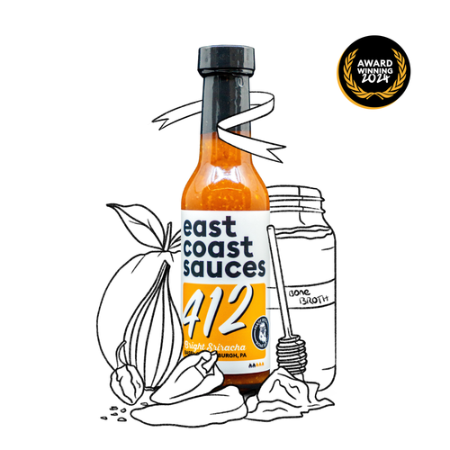 Bottle of east coast sauces A12 hot sauce with illustrations and an award badge on a white background