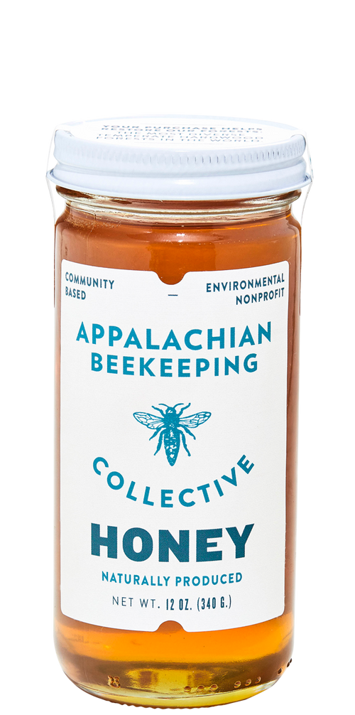 Jar of Appalachian Beekeeping Collective honey on a white background
