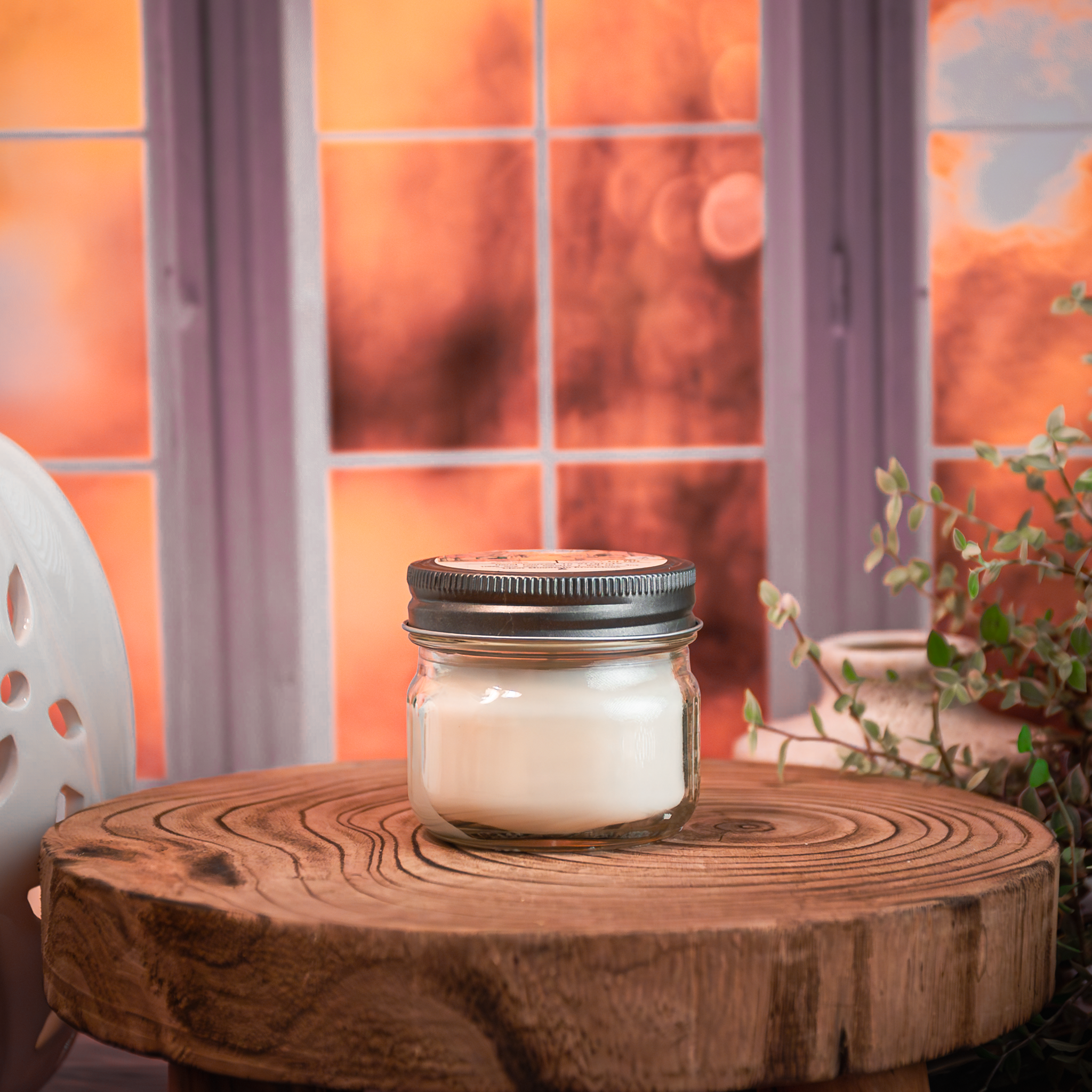 Autumn candle in glass jar on rustic wood table – Harvest Spice fragrance