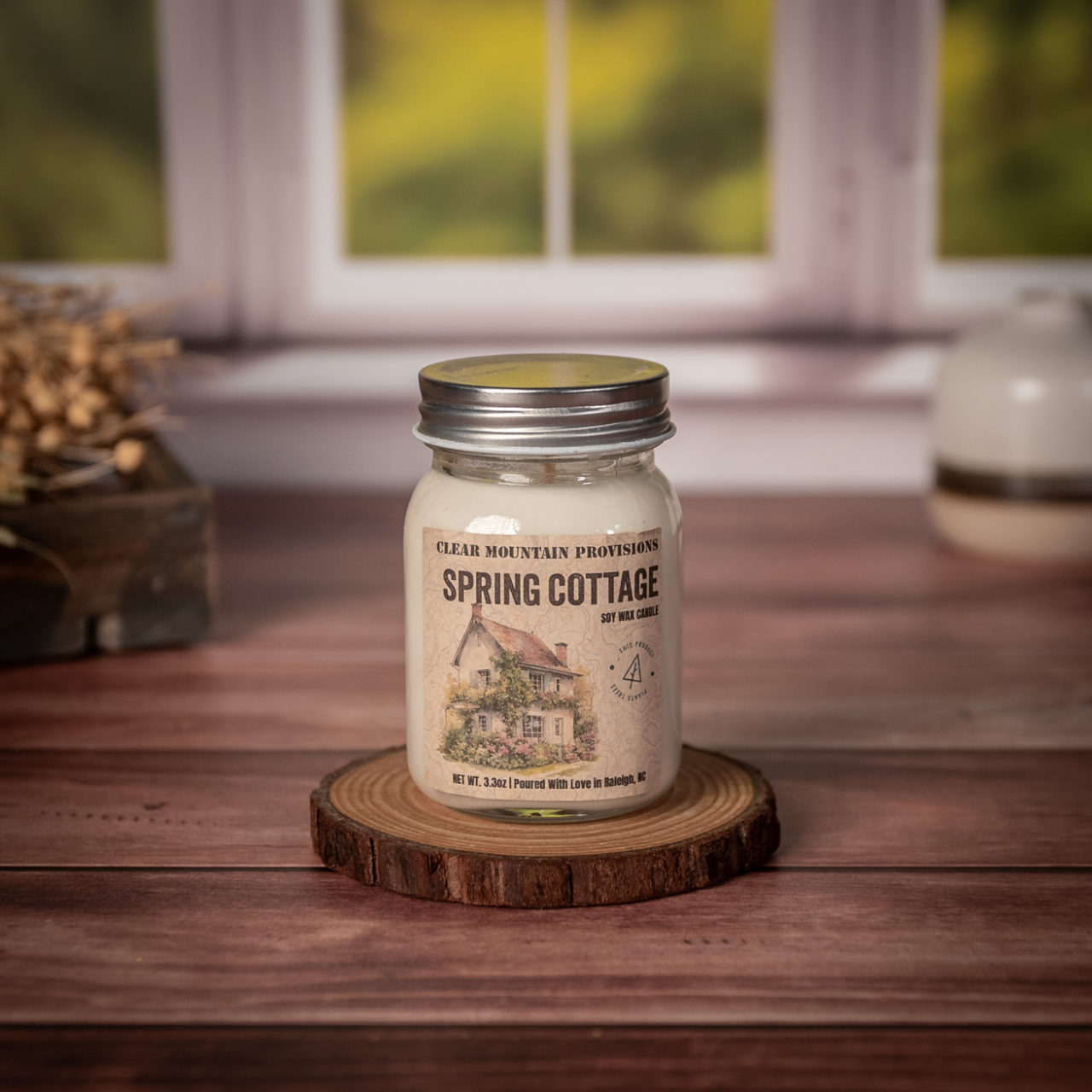 Spring Garden soy wax candle with lily of the valley, rose, and pear scent in eco-friendly jar