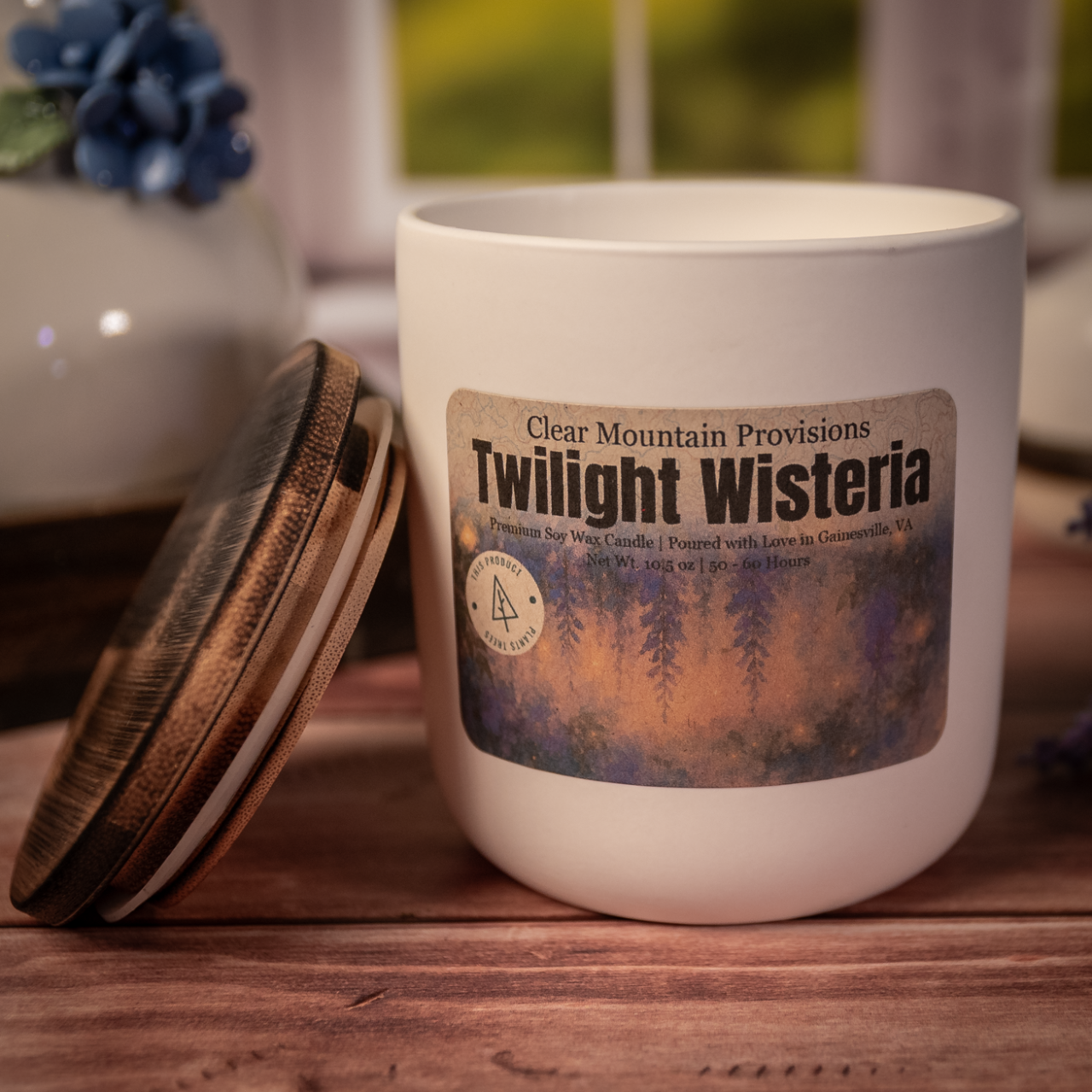 Twilight Wisteria soy wax candle with violet, freesia, and musk notes in ceramic and mason jars